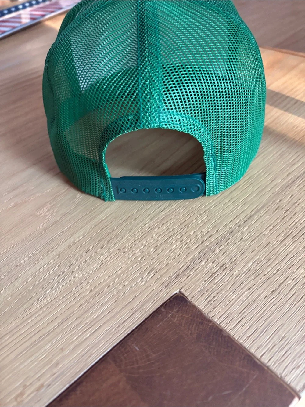 The Classic White and Green Trucker Hat with Nantucket masters Graphic